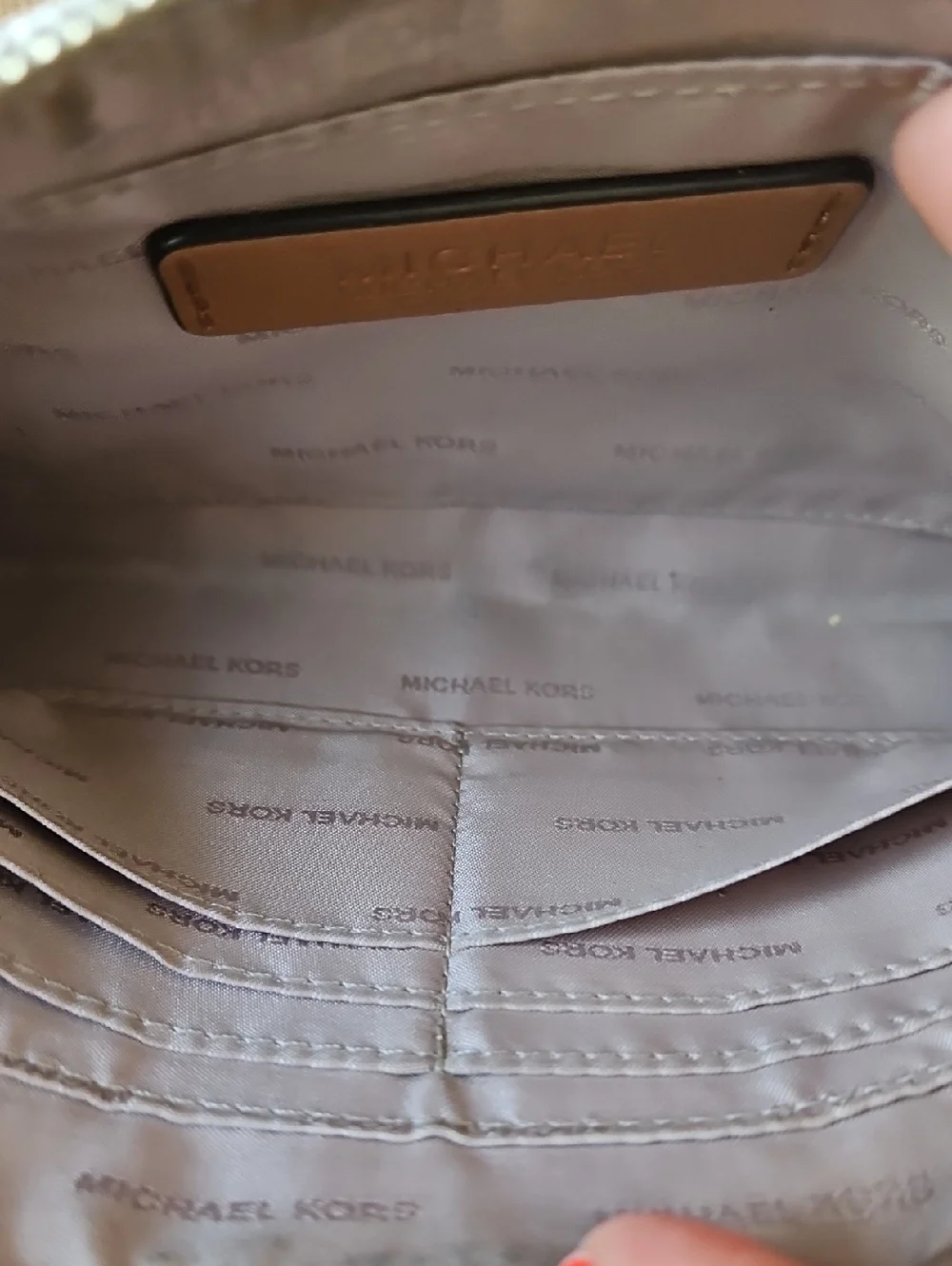 Michael Kors Gold And Cream Signature Perforated Wristlet